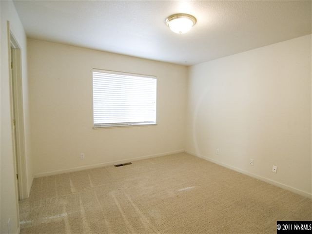 2225 Ridgeview Drive Reno, NV 89519 - Photo 8 of 12 an empty room with a window