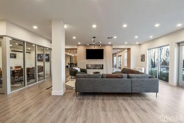 a view of a patio with table and chairs and potted plants