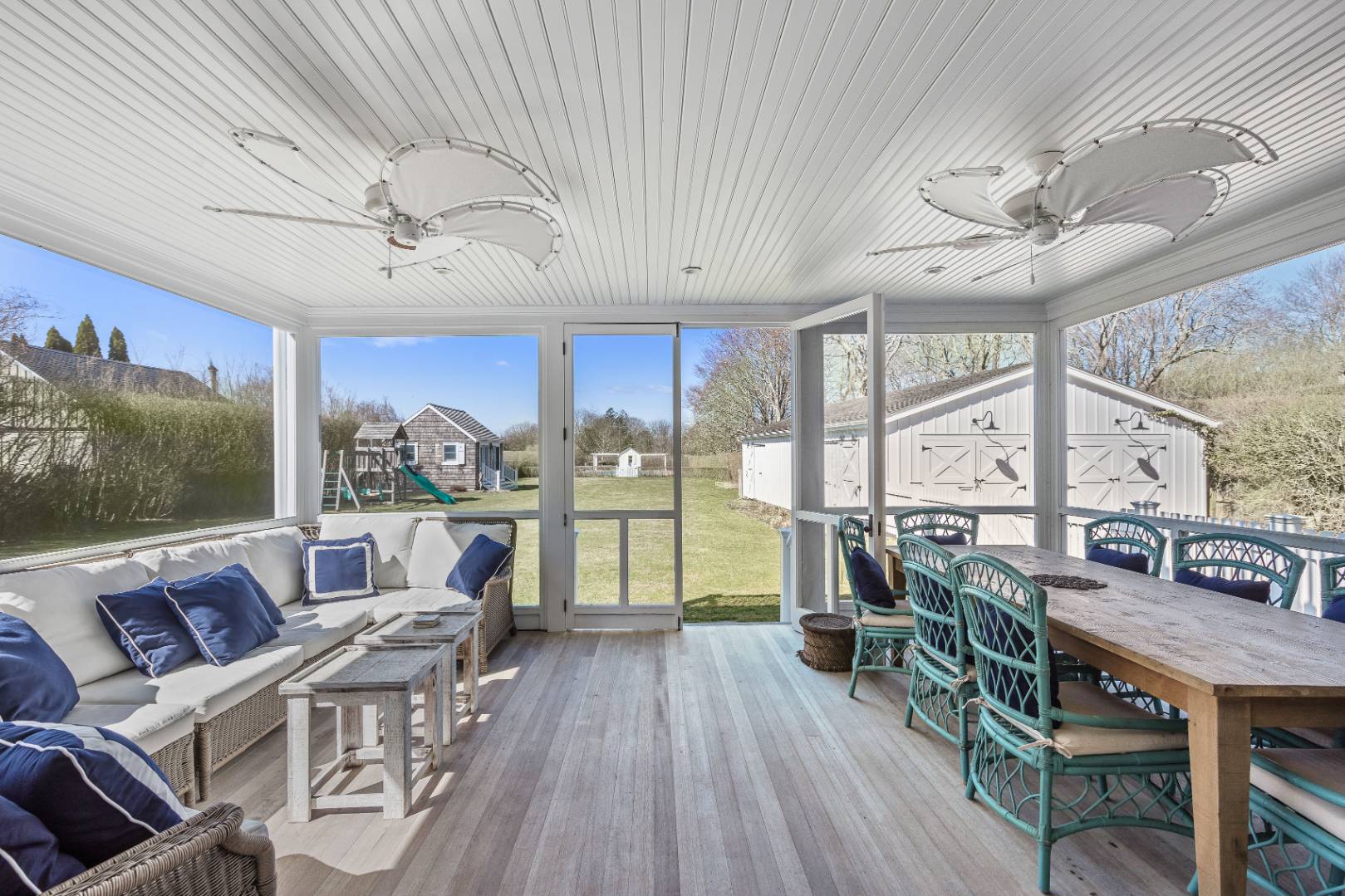 56 Butter Lane Bridgehampton, NY 11932 - Photo 17 of 18 a view of a dining room with furniture window and wooden floor