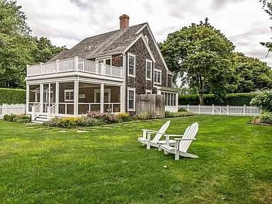 56 Butter Lane Bridgehampton, NY 11932 - Photo 2 of 18 a view of a house with a yard