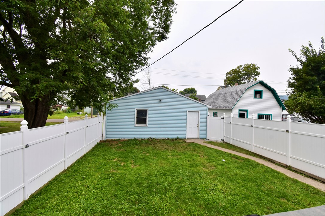 235 Decatur Street Corning, NY 14830 - Photo 36 of 44 Fully fenced-in yard with solar lighting