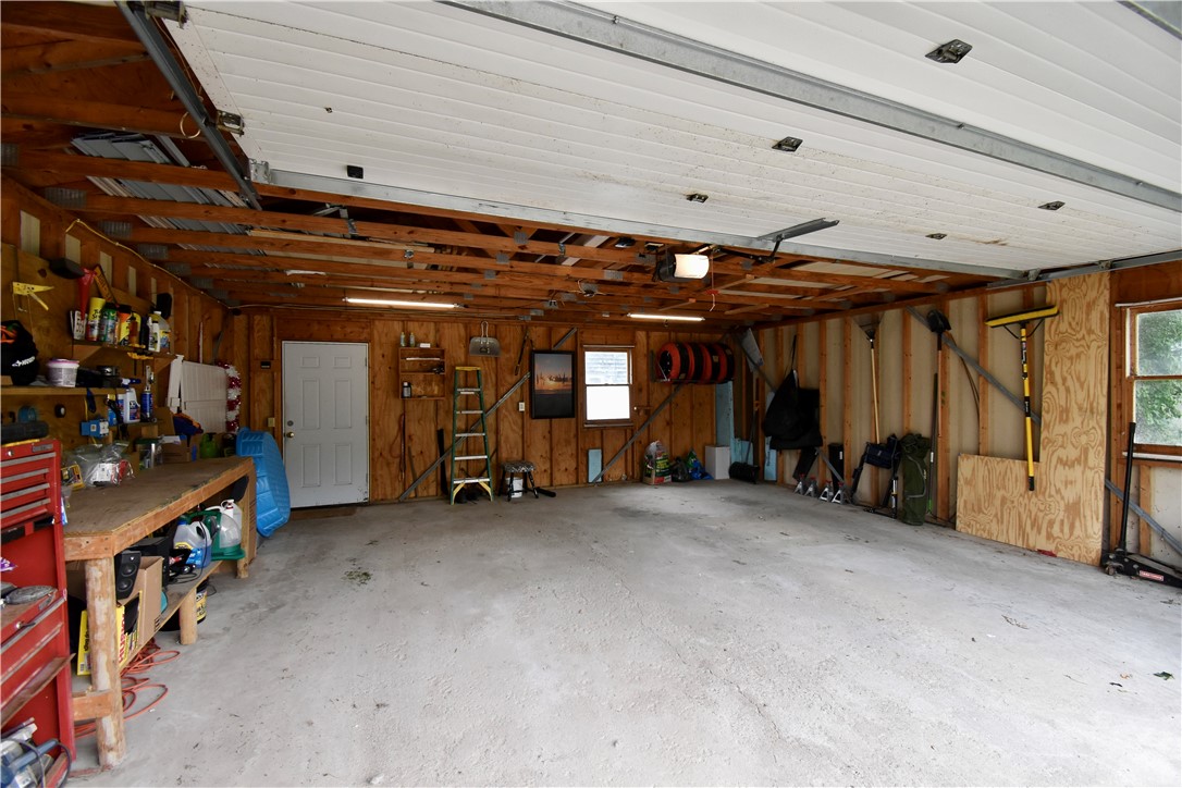 235 Decatur Street Corning, NY 14830 - Photo 41 of 44 Spacious garage with workbench