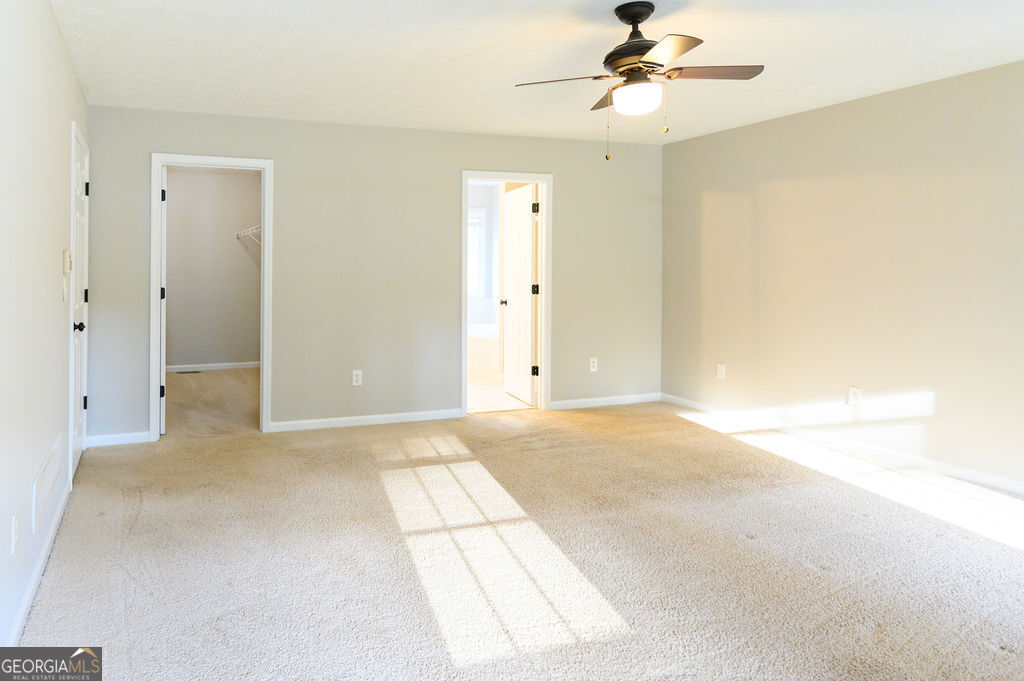 3301 Connie Way Winston, GA 30187 - Photo 19 of 40 an empty room with fan and windows