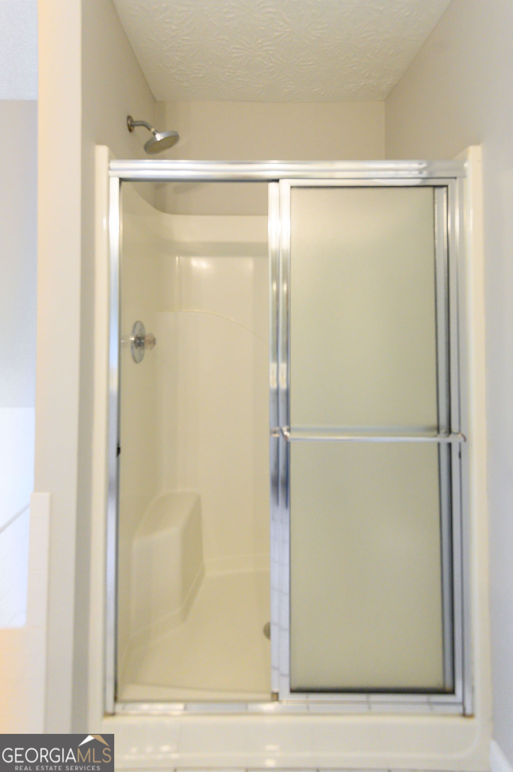 3301 Connie Way Winston, GA 30187 - Photo 21 of 40 a bathroom with a glass shower door