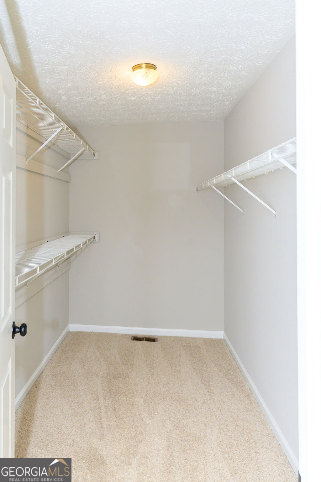 3301 Connie Way Winston, GA 30187 - Photo 24 of 40 a view of a room with racks on the wall