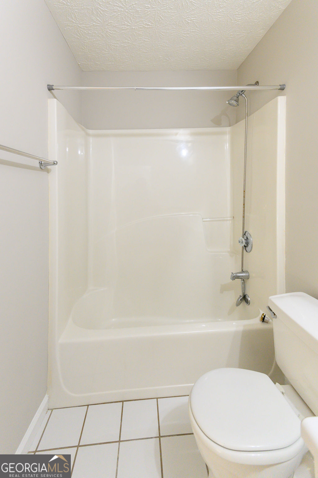 3301 Connie Way Winston, GA 30187 - Photo 32 of 40 a bathroom with a toilet and a shower