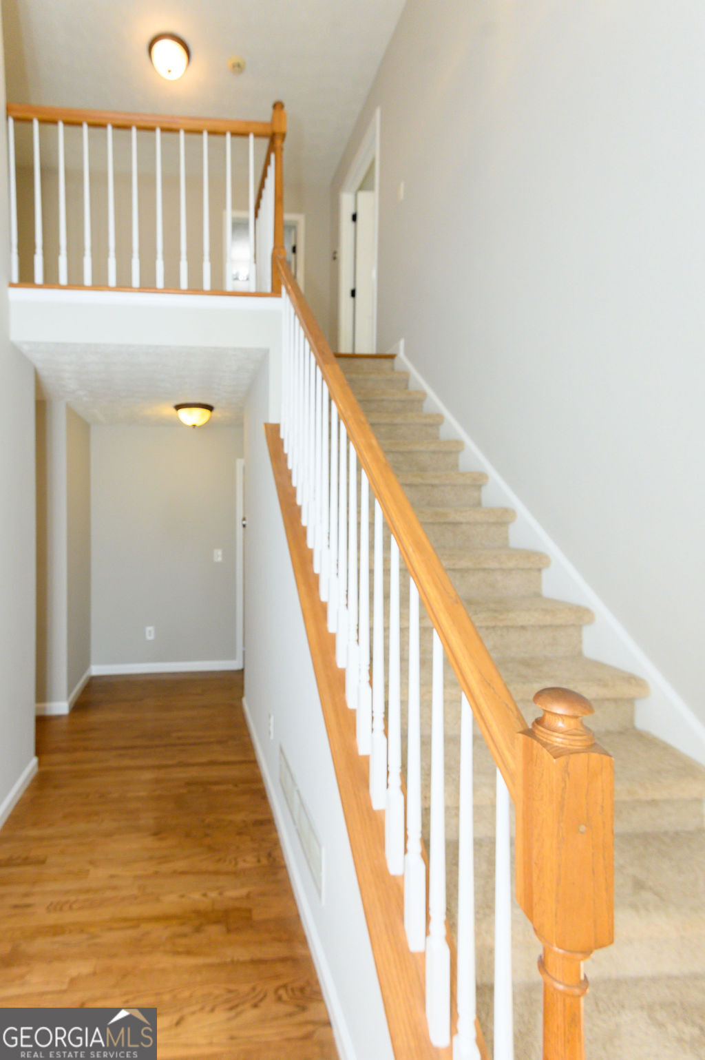 3301 Connie Way Winston, GA 30187 - Photo 7 of 40 a view of staircase with railing and white walls
