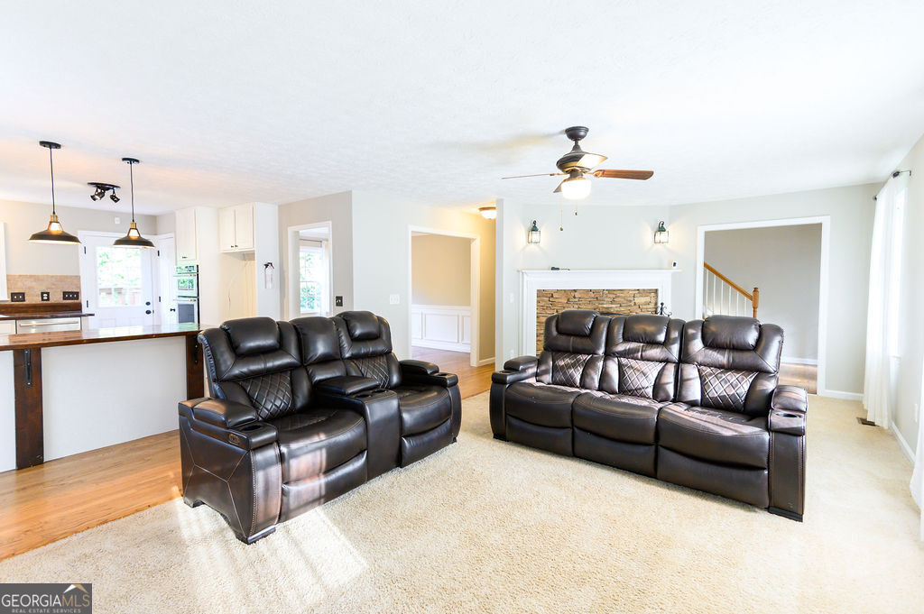 3301 Connie Way Winston, GA 30187 - Photo 10 of 40 a living room with furniture and a fireplace
