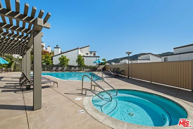 a view of a chairs and table in the terrace