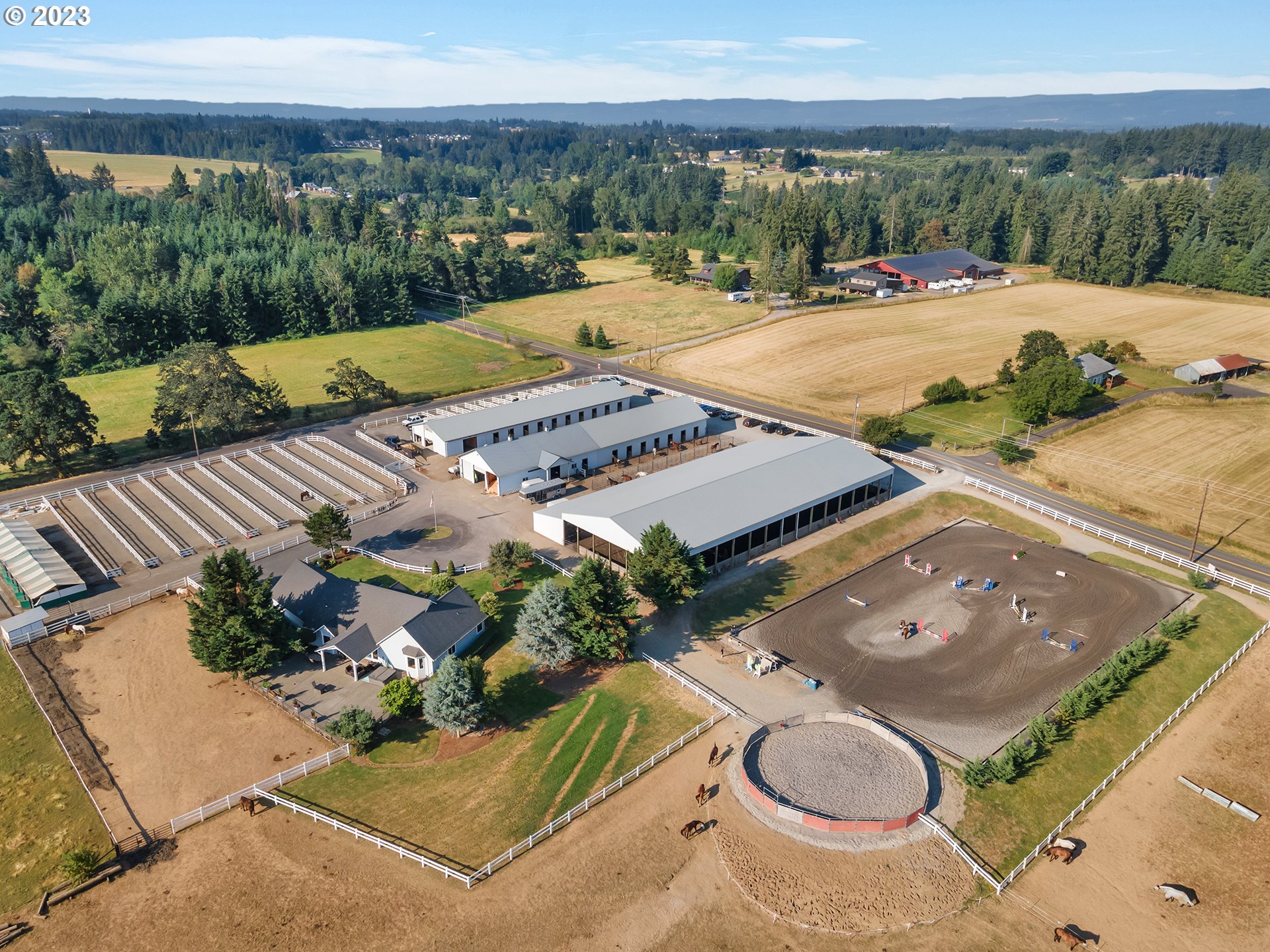 an aerial view of a house with outdoor space