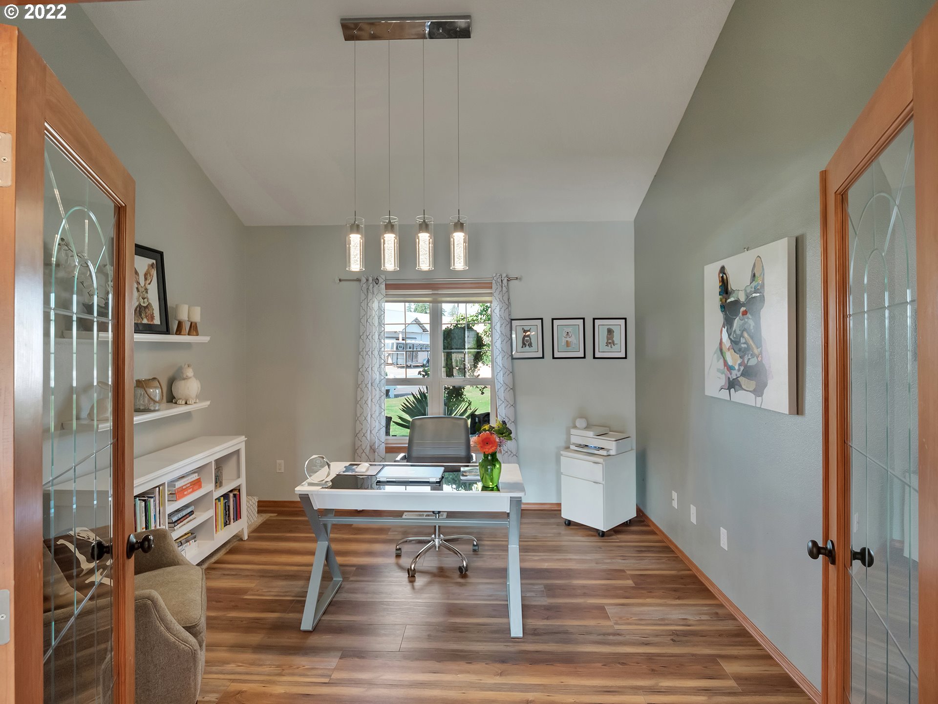 3000 Northwest 299th Street Ridgefield, WA 98642 - Photo 12 of 35 a living room with furniture a chandelier and a table