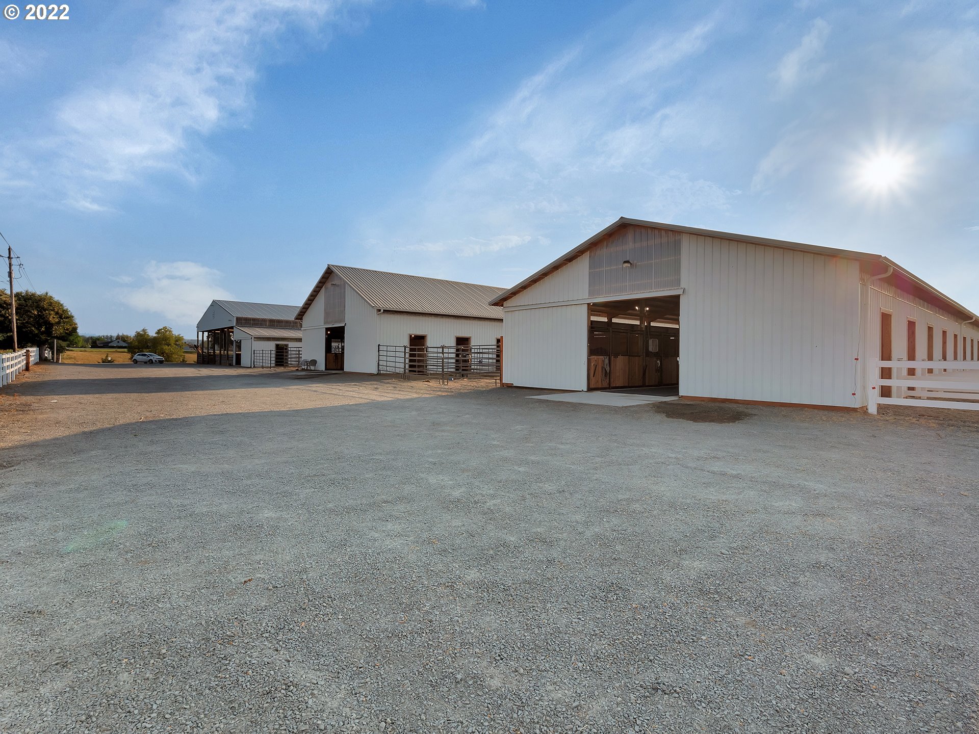 3000 Northwest 299th Street Ridgefield, WA 98642 - Photo 20 of 35 a view of a house with a big yard and large trees