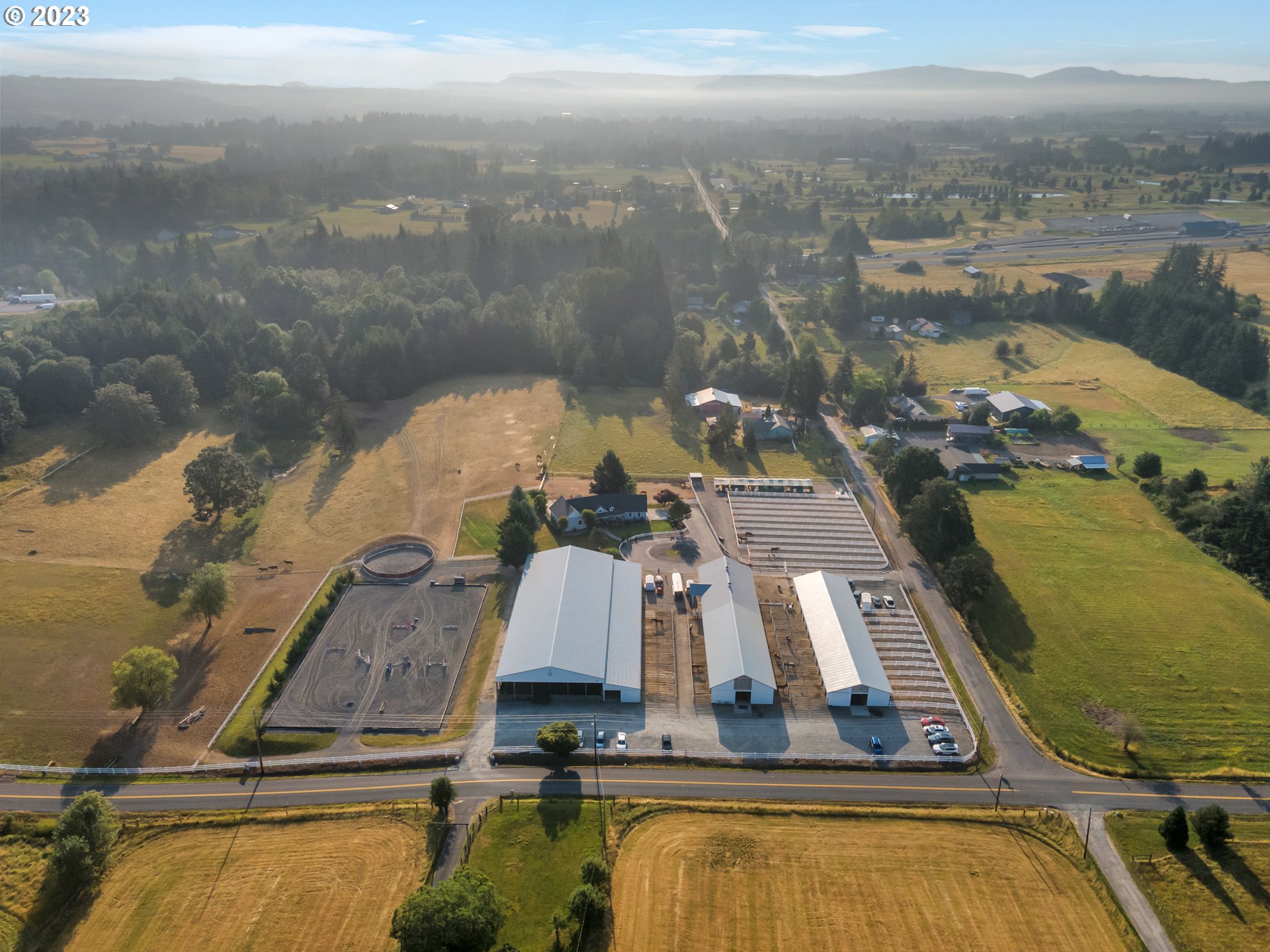 3000 Northwest 299th Street Ridgefield, WA 98642 - Photo 3 of 35 an aerial view of house with yard swimming pool and ocean view