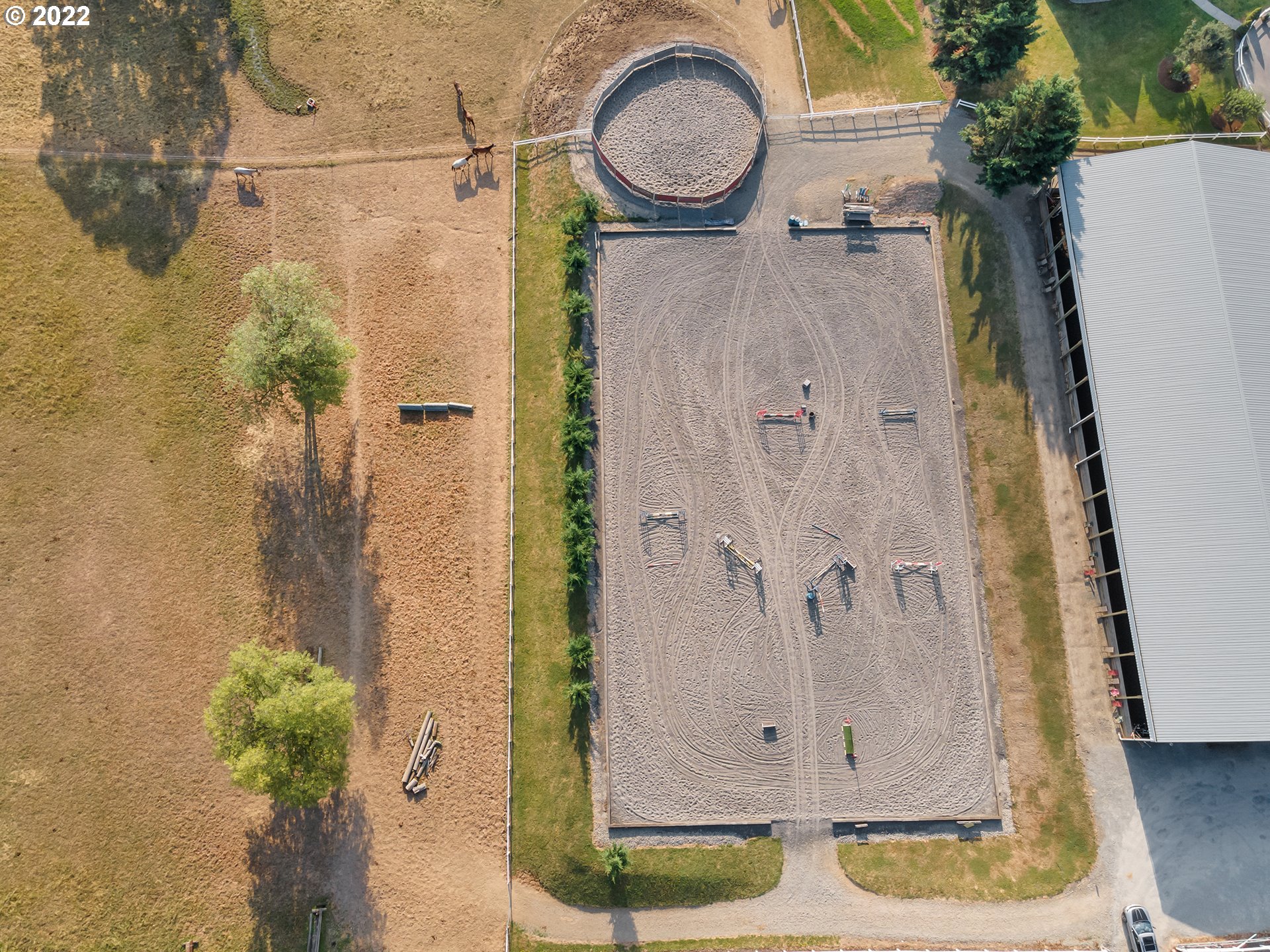 3000 Northwest 299th Street Ridgefield, WA 98642 - Photo 32 of 35 a bathroom with a granite countertop shower a mirror and a sink