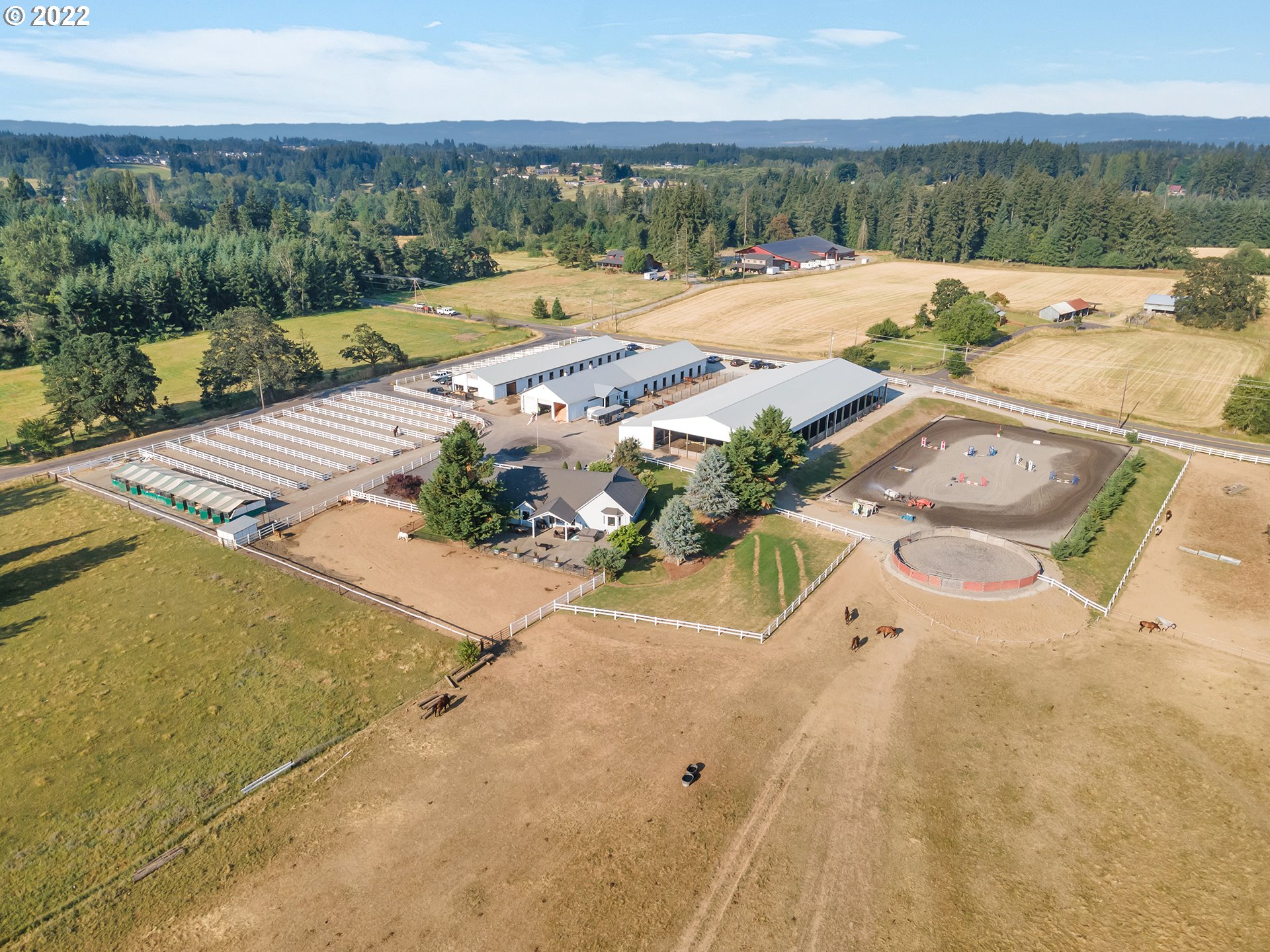3000 Northwest 299th Street Ridgefield, WA 98642 - Photo 33 of 35 a view of swimming pool with a table and chairs
