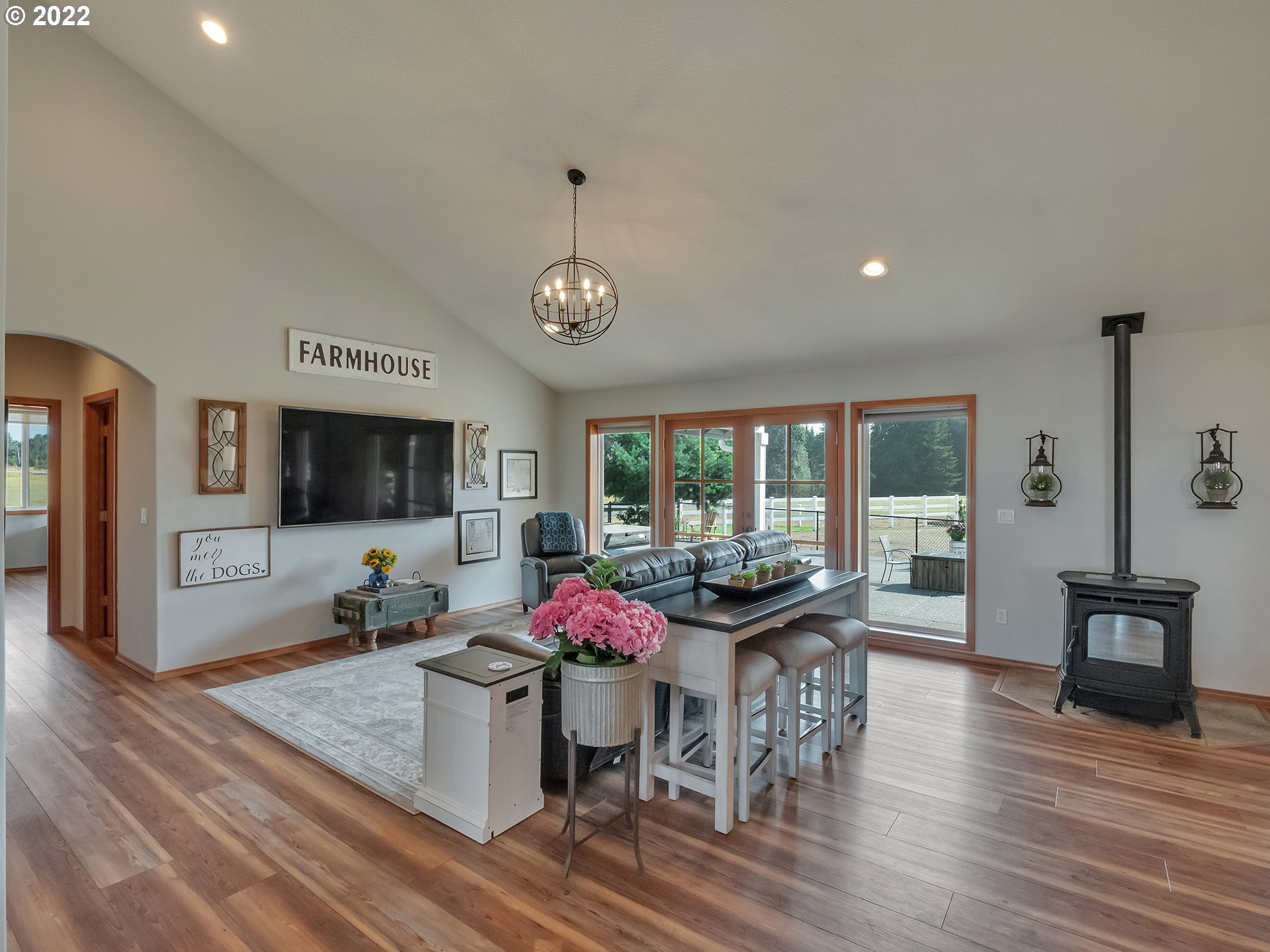 3000 Northwest 299th Street Ridgefield, WA 98642 - Photo 7 of 35 a view of a dining room with furniture window and wooden floor