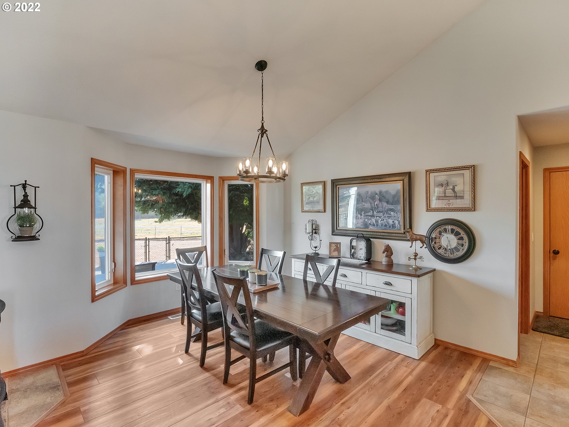3000 Northwest 299th Street Ridgefield, WA 98642 - Photo 8 of 35 a view of a dining room with furniture window and wooden floor