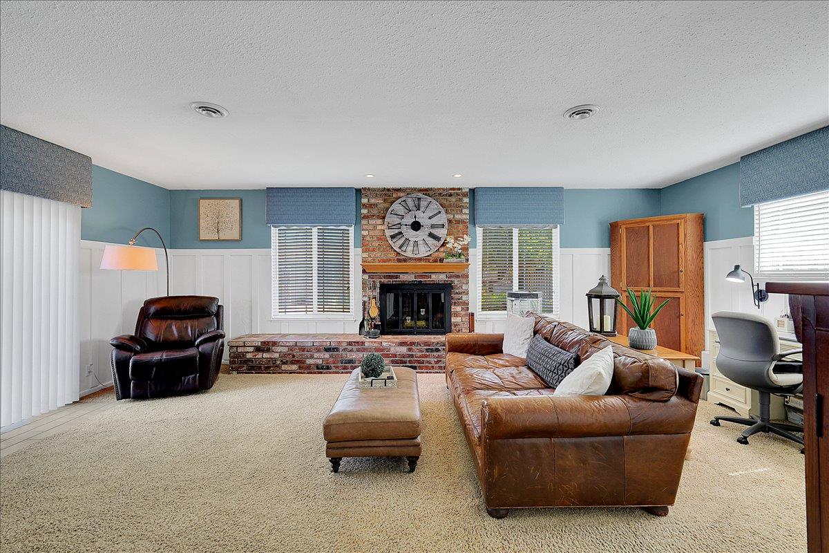 37052 Poplar Street Newark, CA 94560 - Photo 26 of 54 huge family room with fireplace