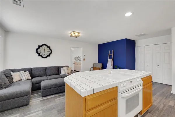 a kitchen with a sink and cabinets
