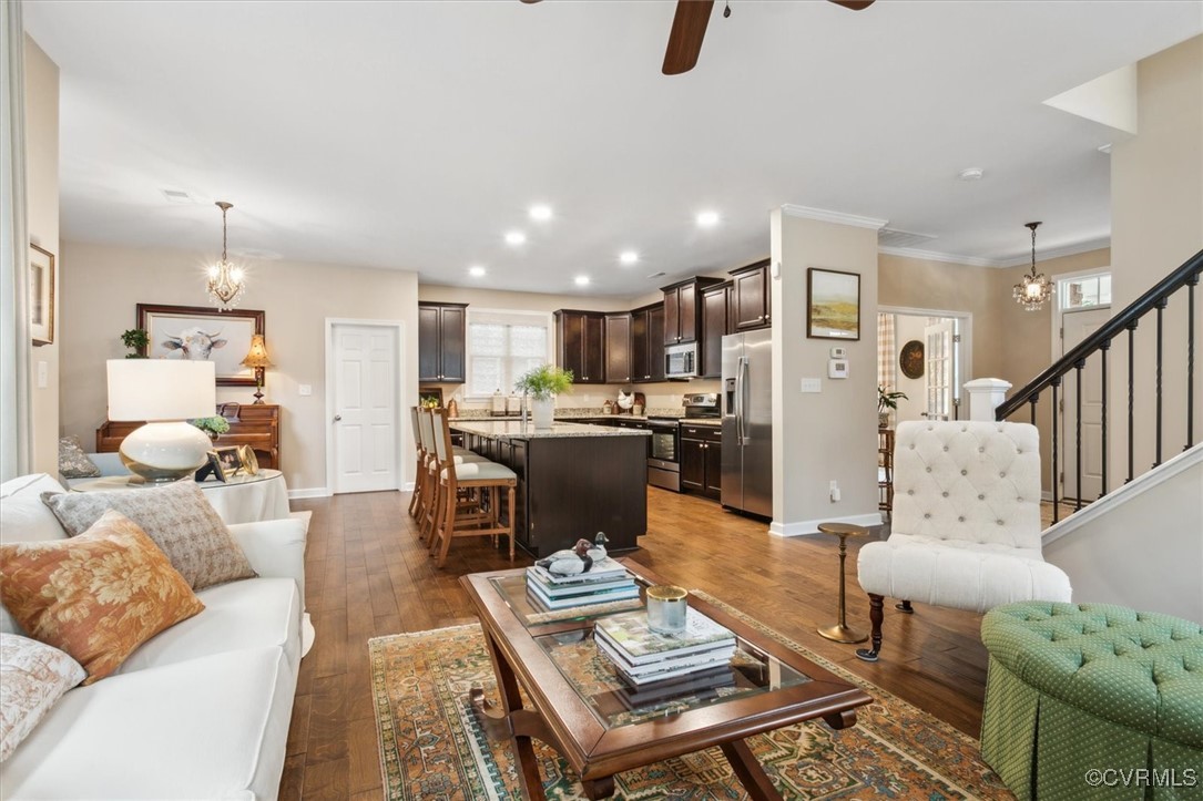 5587 Brixton Road Williamsburg, VA 23185 - Photo 11 of 42 a living room with furniture and kitchen view
