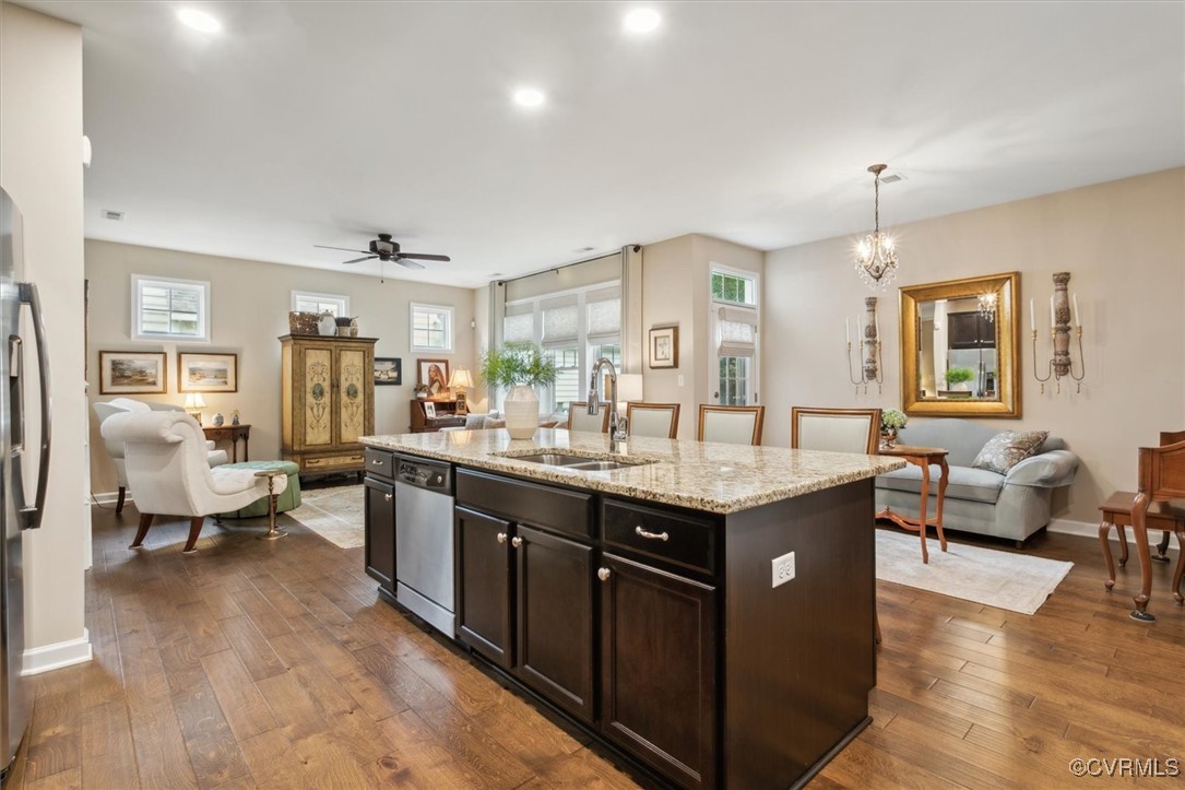 5587 Brixton Road Williamsburg, VA 23185 - Photo 16 of 42 a view of living room with granite countertop furniture and fireplace