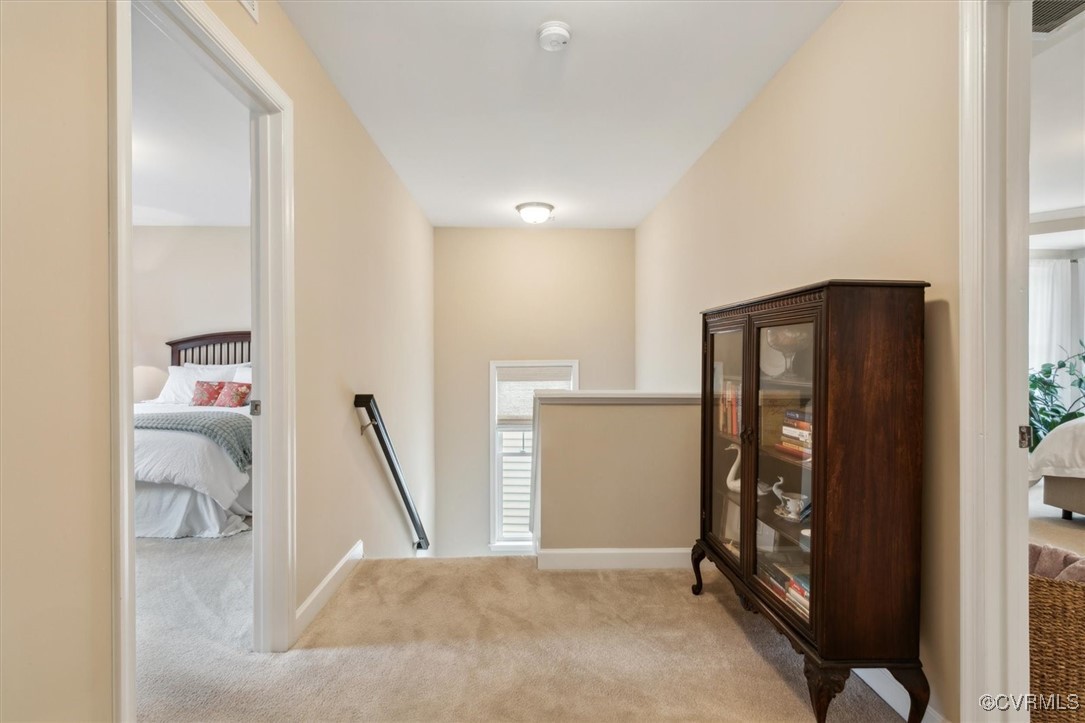 5587 Brixton Road Williamsburg, VA 23185 - Photo 24 of 42 a bedroom with a bed and a window