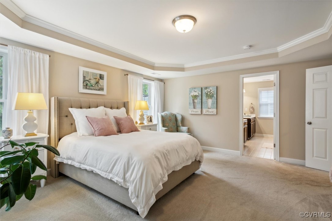 5587 Brixton Road Williamsburg, VA 23185 - Photo 29 of 42 a bedroom with a bed and a large window