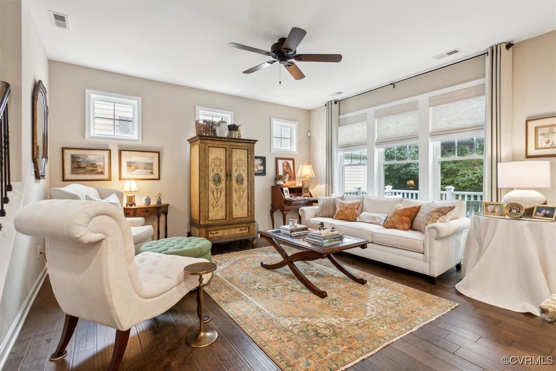 5587 Brixton Road Williamsburg, VA 23185 - Photo 10 of 42 a living room with furniture and a large window