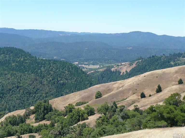 7205 Clow Ridge Road Philo, CA 95466 - Photo 1 of 1 an aerial view of a house with mountain view