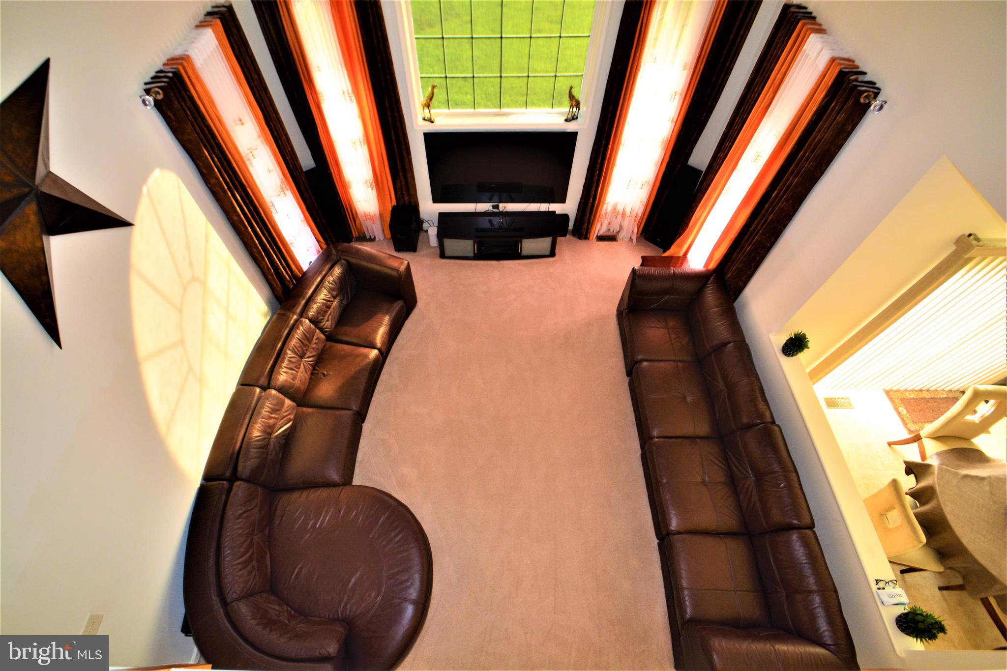 176 Gravelly Run Branch Road Clayton, DE 19938 - Photo 14 of 52 a view of a living room with furniture and a mirror