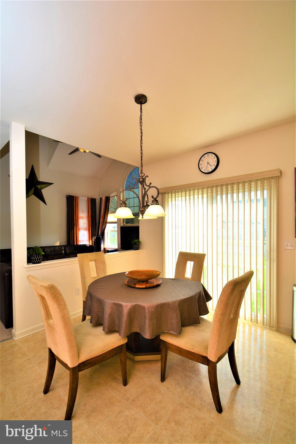 176 Gravelly Run Branch Road Clayton, DE 19938 - Photo 24 of 52 a dining room with furniture and window