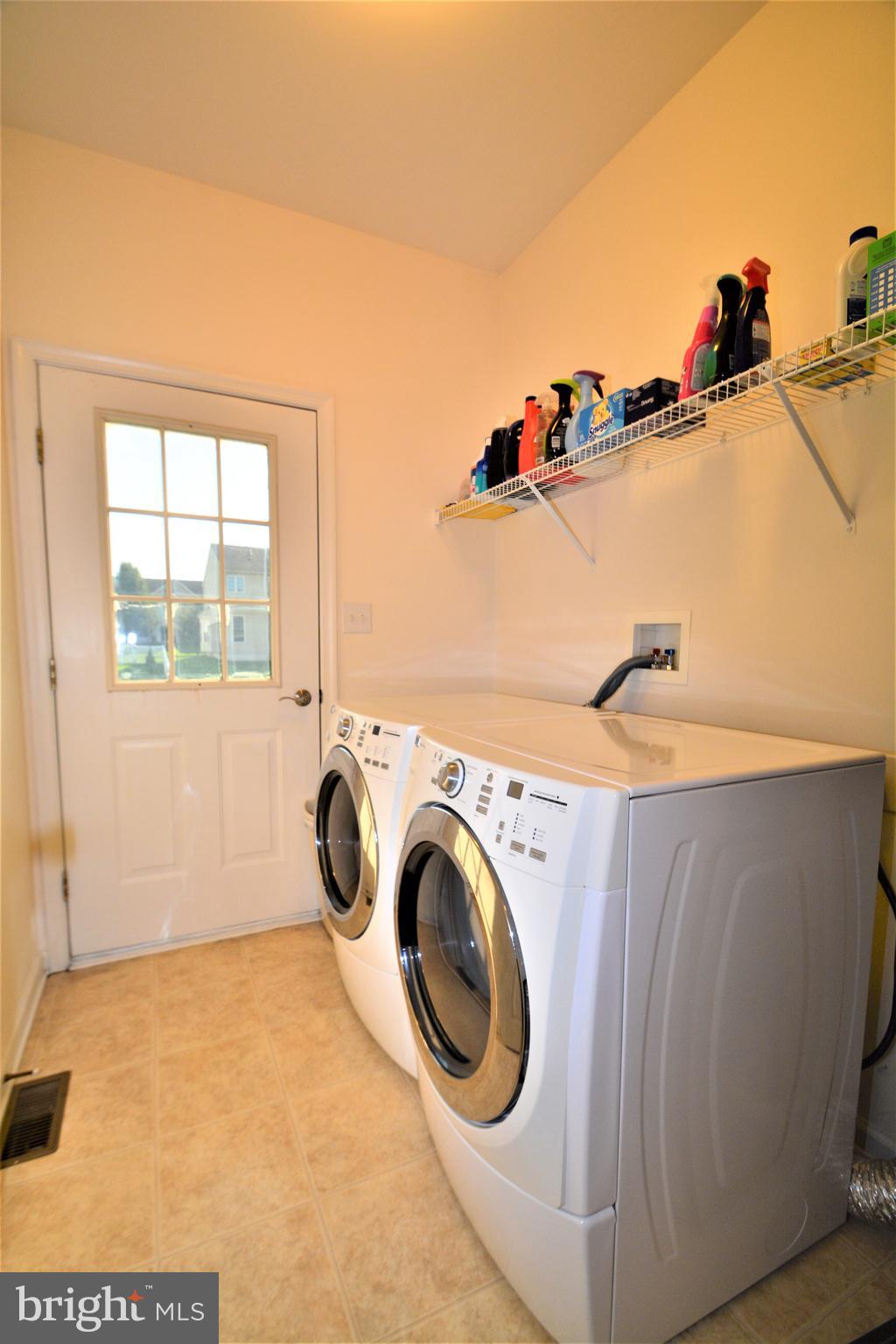 176 Gravelly Run Branch Road Clayton, DE 19938 - Photo 25 of 52 a utility room with dryer and washer