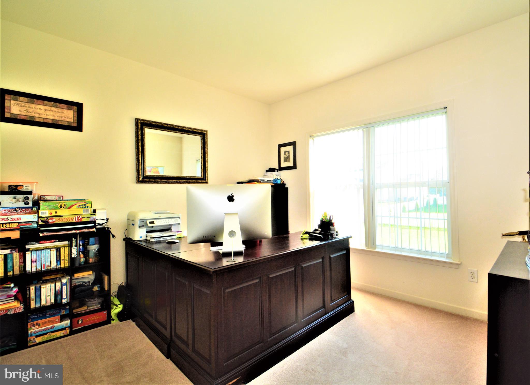 176 Gravelly Run Branch Road Clayton, DE 19938 - Photo 26 of 52 a living room with stainless steel appliances kitchen island granite countertop a sink and a wooden floor