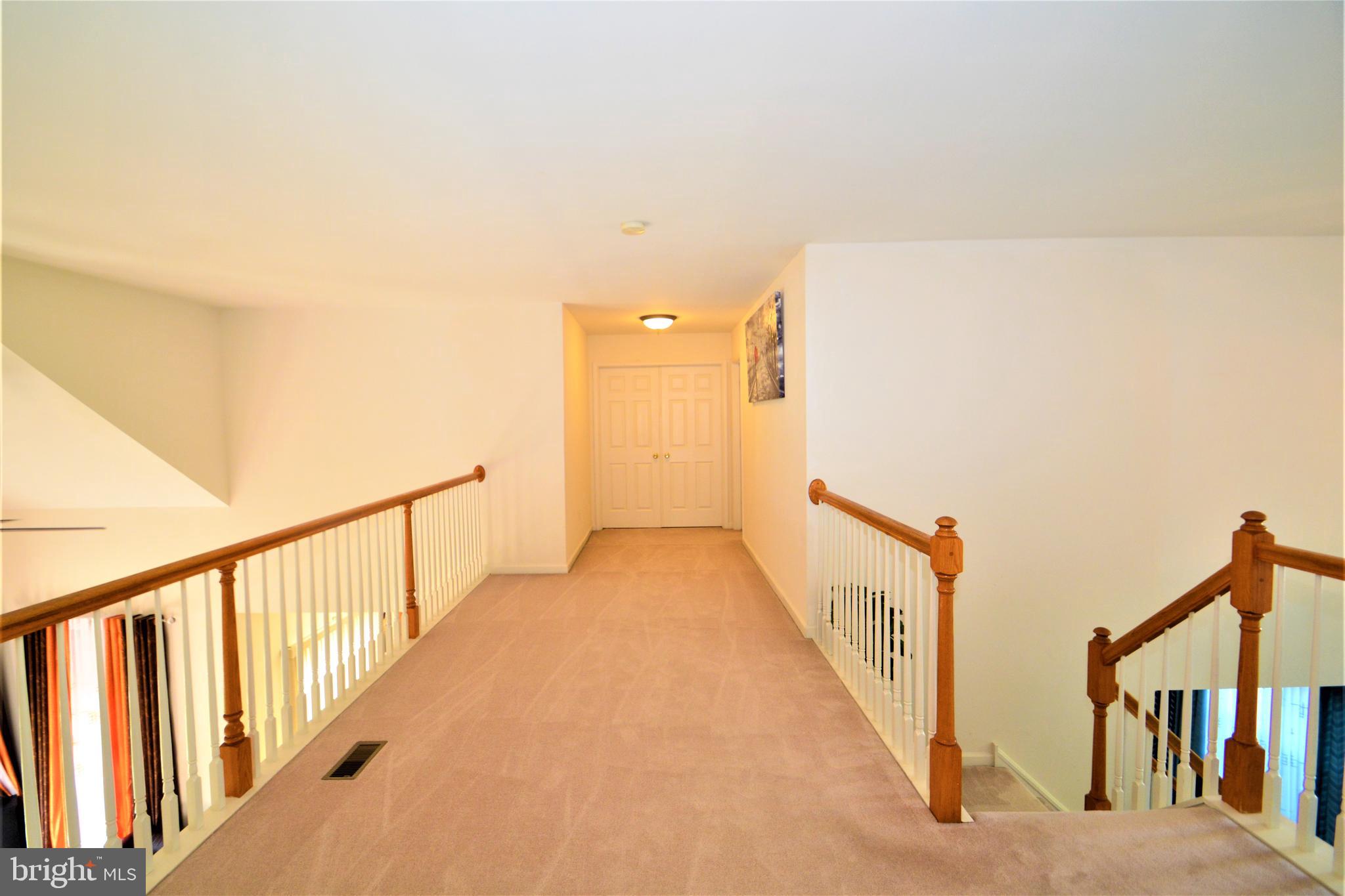 176 Gravelly Run Branch Road Clayton, DE 19938 - Photo 30 of 52 a view of a hallway with staircase