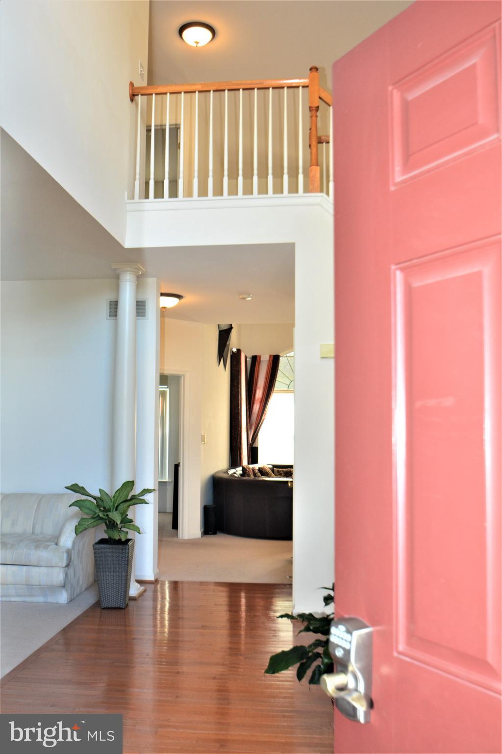 176 Gravelly Run Branch Road Clayton, DE 19938 - Photo 3 of 52 a living room with furniture and a potted plant