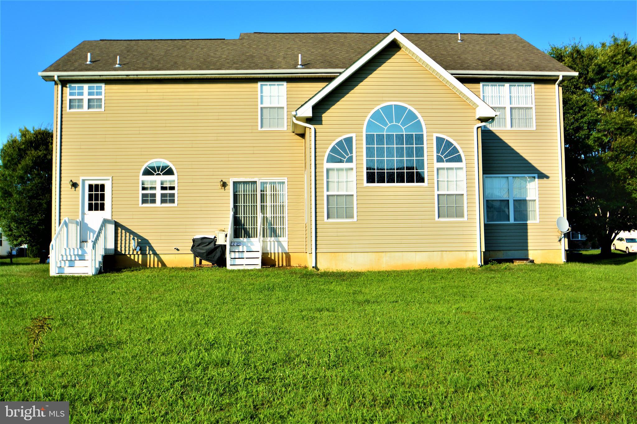 176 Gravelly Run Branch Road Clayton, DE 19938 - Photo 49 of 52 a view of a house with a yard