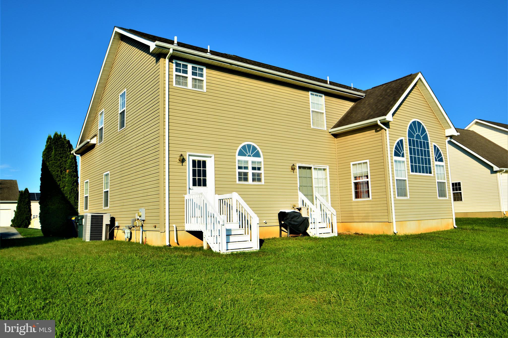 176 Gravelly Run Branch Road Clayton, DE 19938 - Photo 51 of 52 a front view of a house with a yard