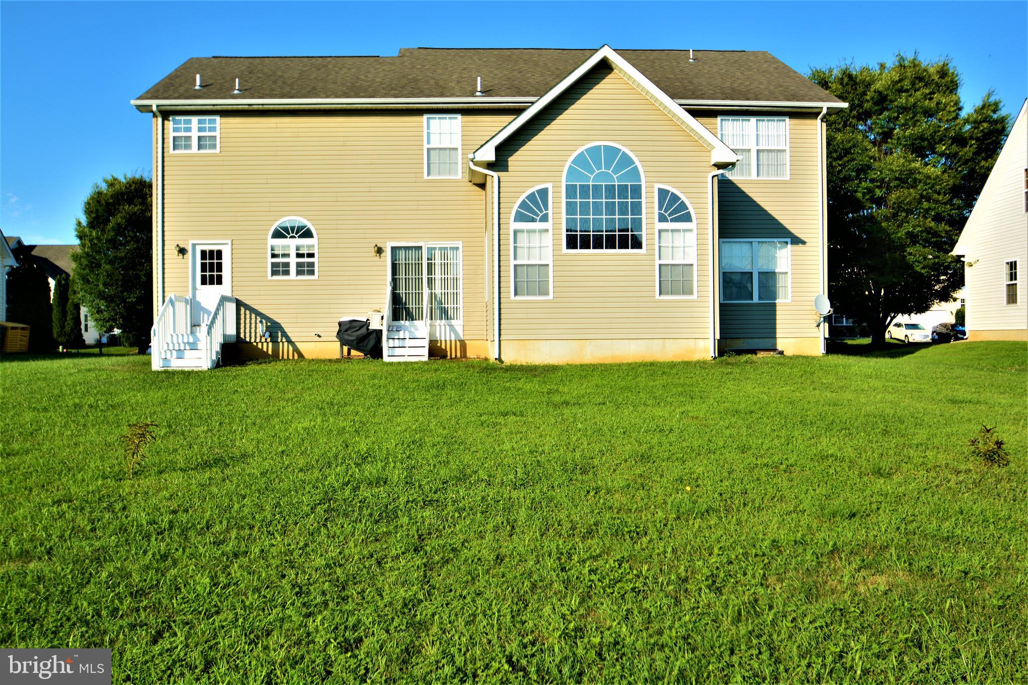 176 Gravelly Run Branch Road Clayton, DE 19938 - Photo 52 of 52 a front view of a house with a yard