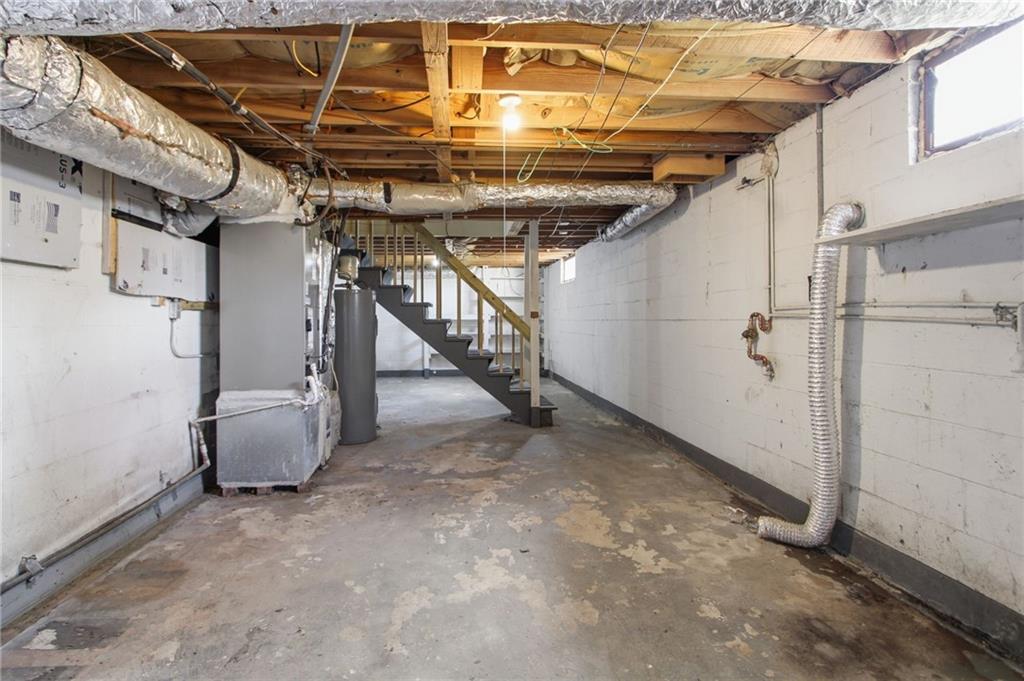 2366 Flint Rock Road Southwest Stone Mountain, GA 30087 - Photo 31 of 40 a view of an empty room with stairs
