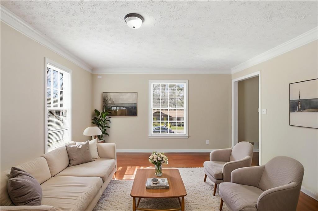 2366 Flint Rock Road Southwest Stone Mountain, GA 30087 - Photo 4 of 40 a living room with furniture and a window