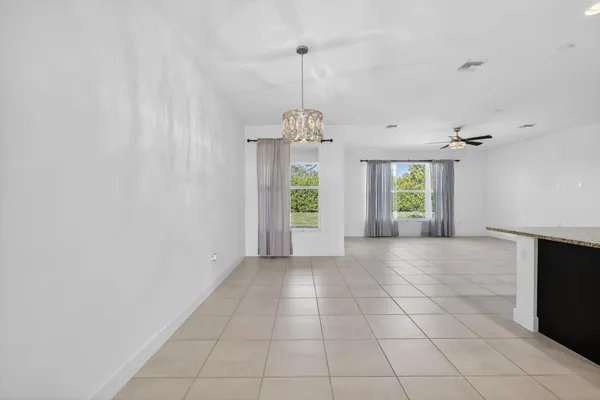 a living room with furniture and view of living room