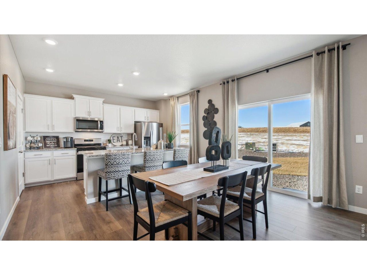2338 Base Street Fort Lupton, CO 80621 - Photo 3 of 24 a kitchen with a table and chairs