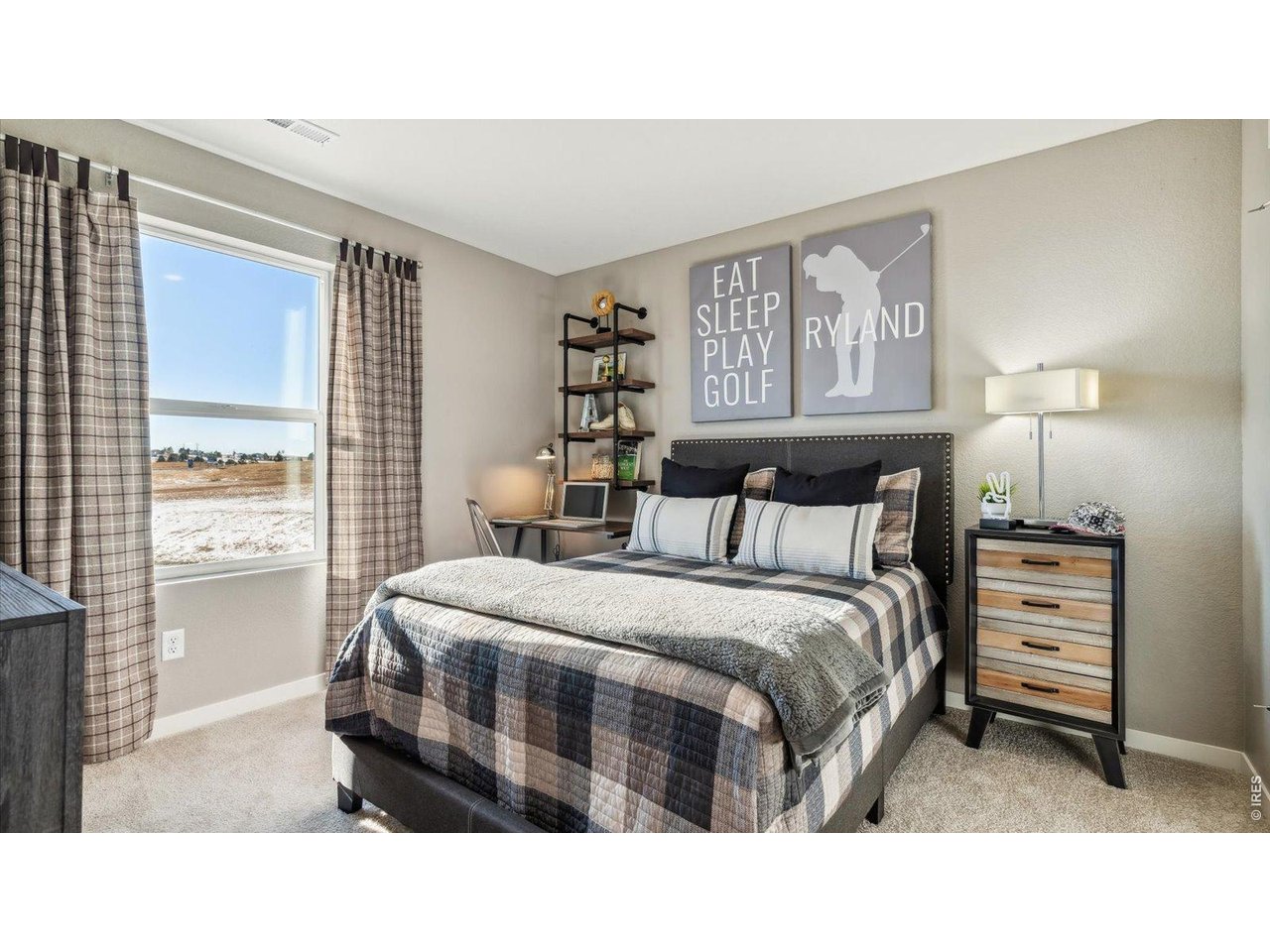 2338 Base Street Fort Lupton, CO 80621 - Photo 6 of 24 a bedroom with a bed a dresser next to a window