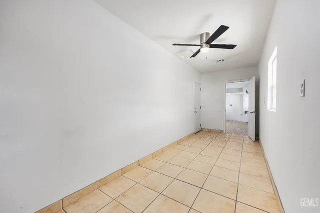 a view of a house with a backyard and windows