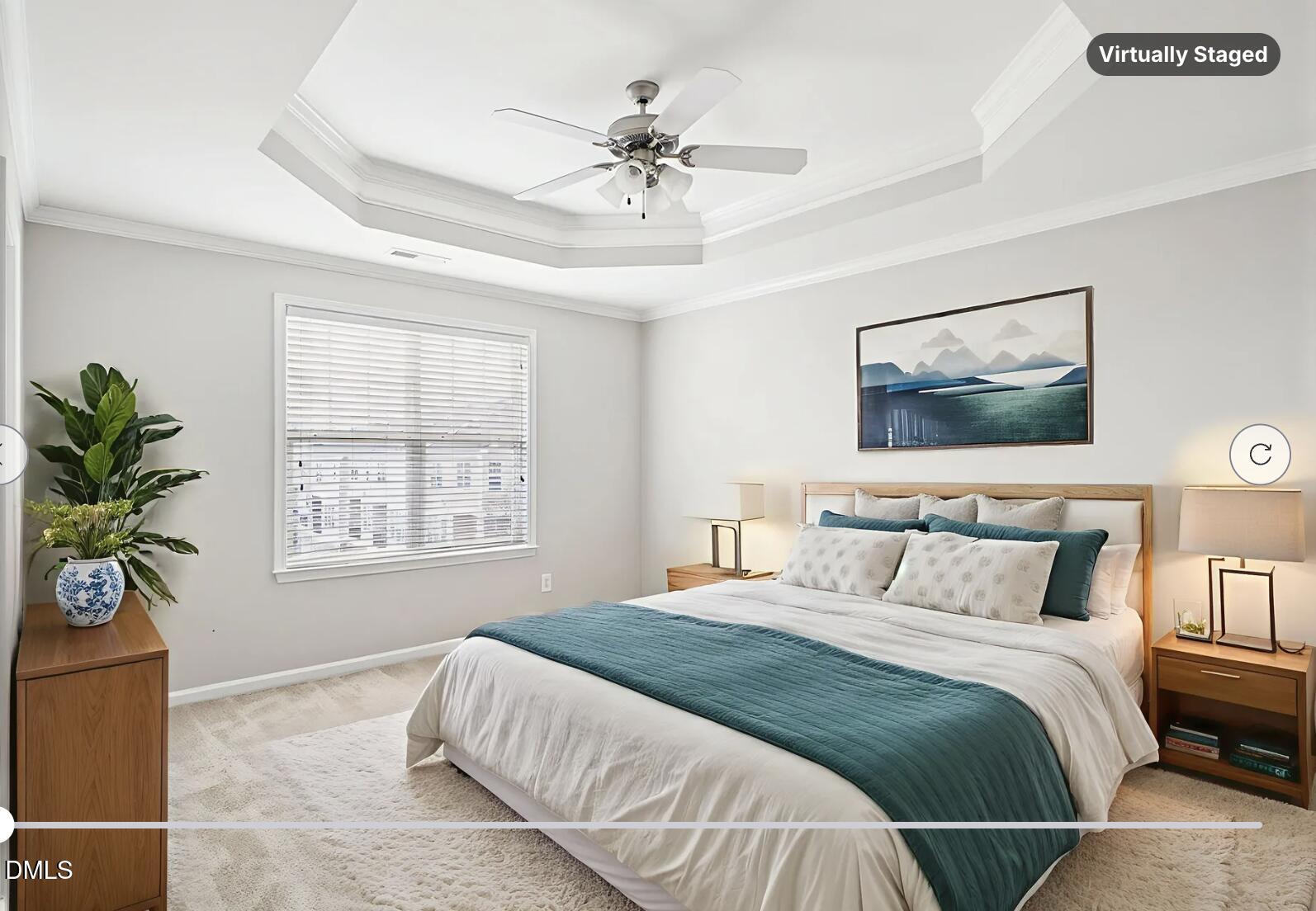 9238 Wooden Road Raleigh, NC 27617 - Photo 26 of 45 a bedroom with a bed and a window