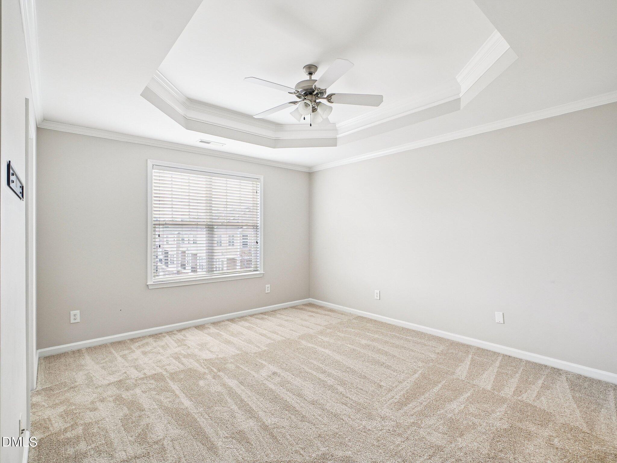 9238 Wooden Road Raleigh, NC 27617 - Photo 27 of 45 a view of an empty room with a window