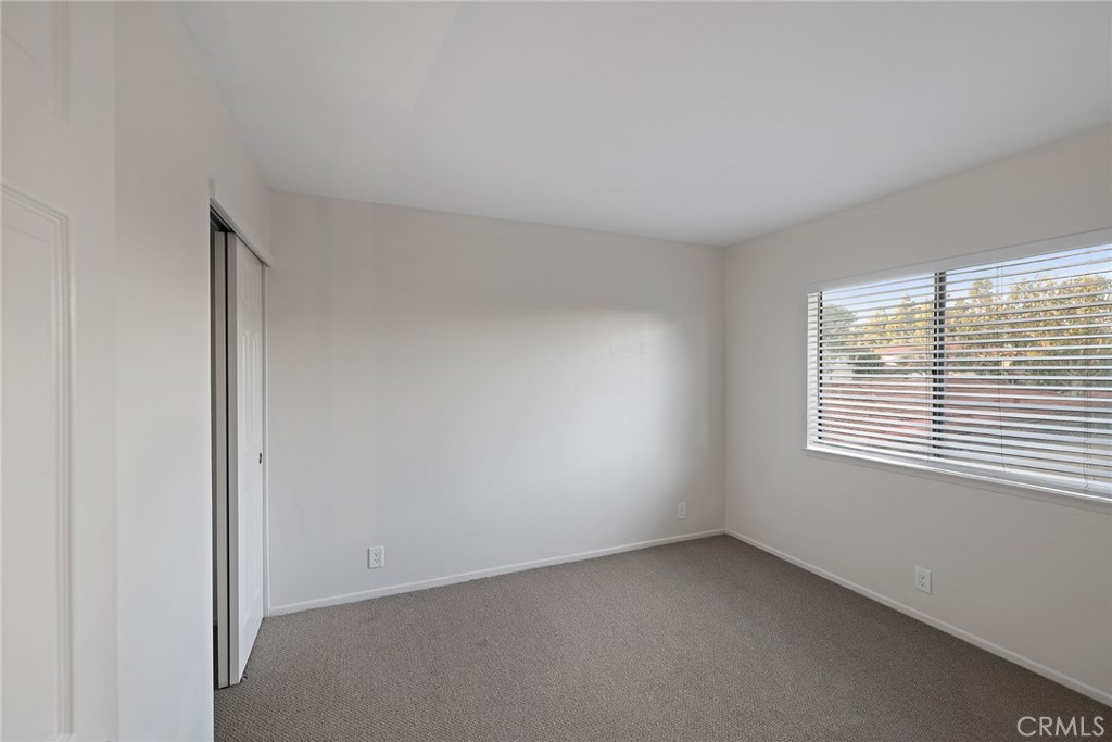33666 Surfside Drive, Unit 38 Dana Point, CA 92629 - Photo 29 of 39 a view of an empty room with a window