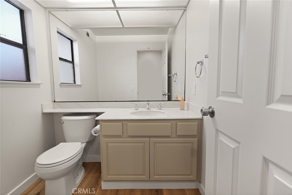 33666 Surfside Drive, Unit 38 Dana Point, CA 92629 - Photo 33 of 39 a bathroom with a sink and a toilet