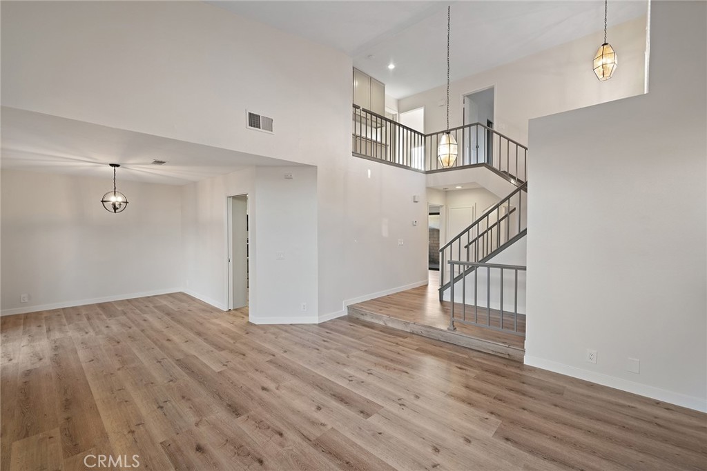 33666 Surfside Drive, Unit 38 Dana Point, CA 92629 - Photo 5 of 39 a view of entryway and hall with wooden floor
