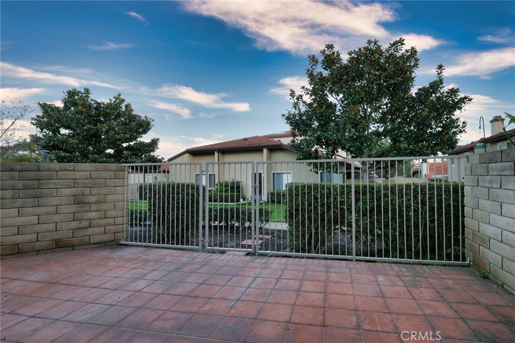 33666 Surfside Drive, Unit 38 Dana Point, CA 92629 - Photo 9 of 39 a view of a black gate